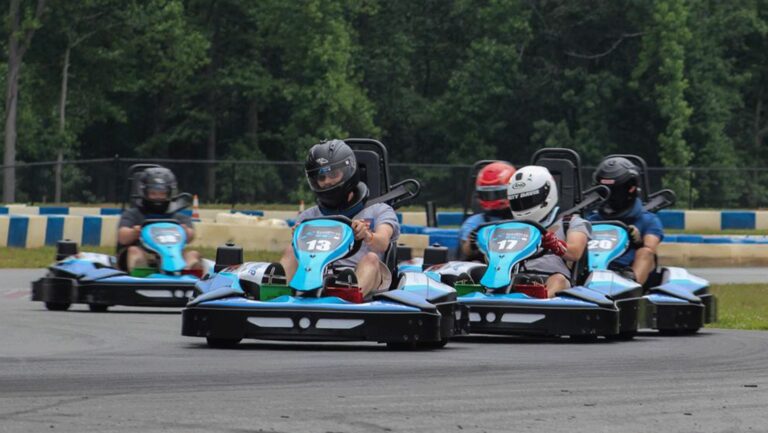 A group of karts racing on our track.